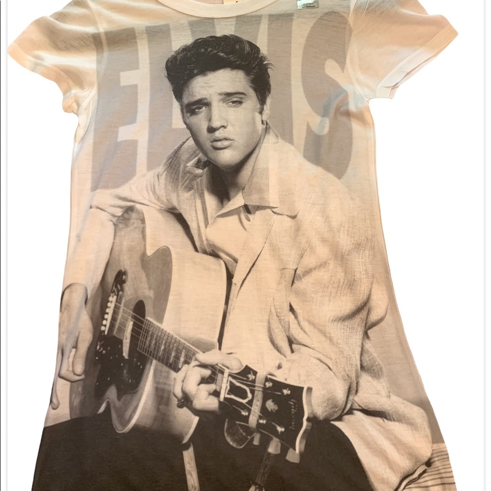 T-shirt by logo Vision with hand painted still in good condition elves priestly